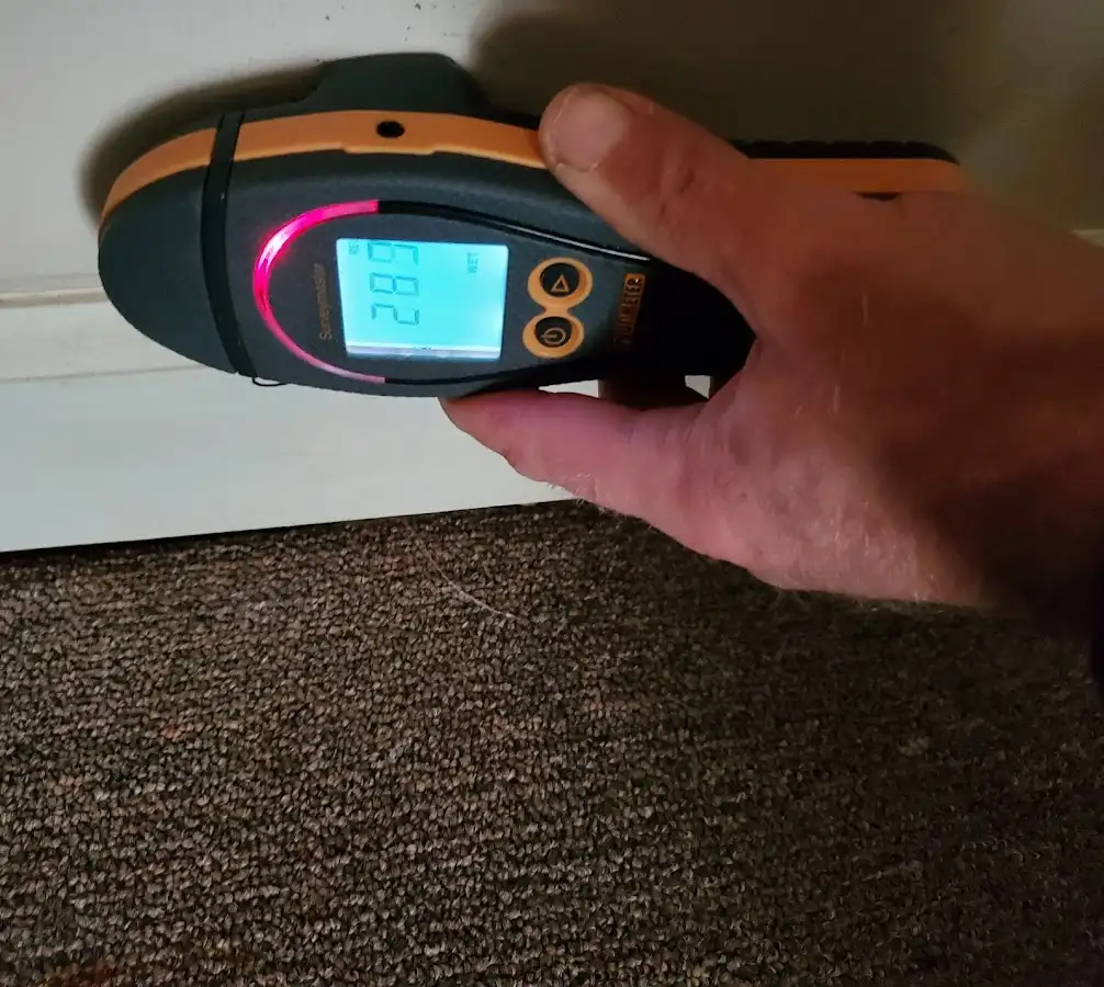 Moisture detection at baseboard during Burst Pipe Cleanup in Pleasant Hill